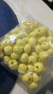 Light yellow cotton thread beads