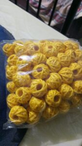 Yellow cotton thread beads