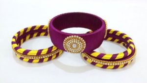 Yellow and purple silk thread bangles set