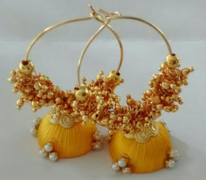 yellow hoop rings with loreals