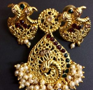 loreal peacock pendant and earrings