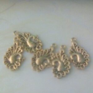 Antique peacock charms