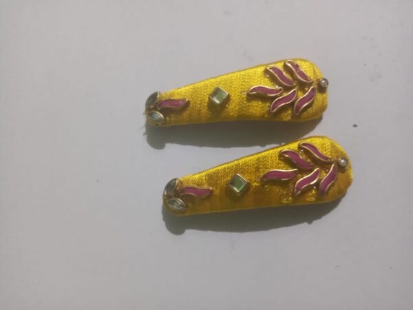 Yellow silk thread tic tac clips