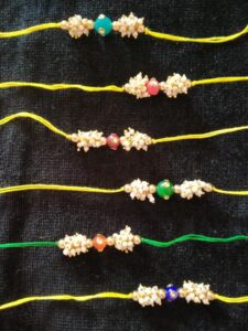 Stone bead rakhi with loreals