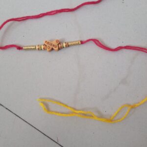 Red and yellow friendship band or rakhi