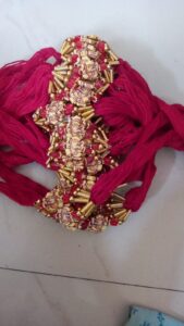 Red thread Ganesha rakhi