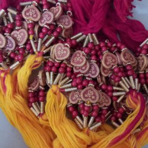 Red and yellow heart shape bead rakhi