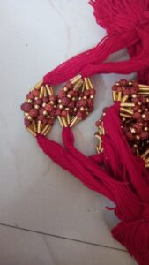 Red plastic rudraksha rakhis