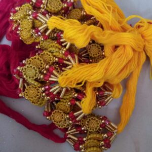 Red and yellow thead rakhi