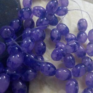Dark violet oval pattern glass beads