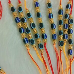 Handmade rakhi with evil eye beads