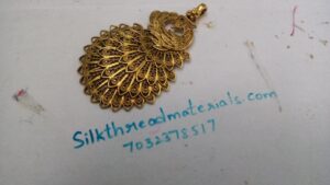 Antique gold peacock pendant