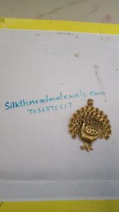 Antique gold peacock pendant 