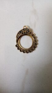 Antique gold round pendant