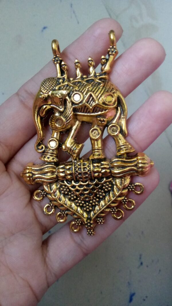 Antique gold elephant pendant