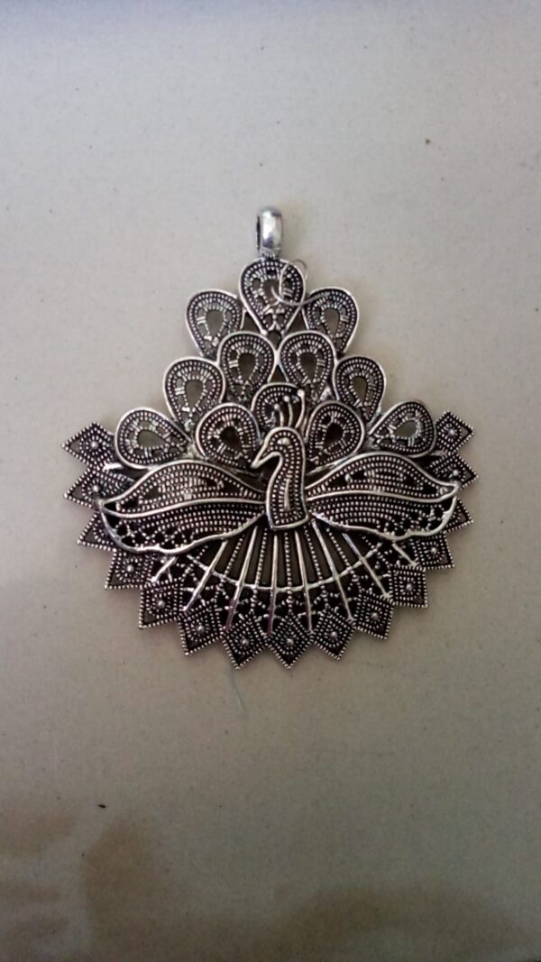 Antique silver peacock pendant