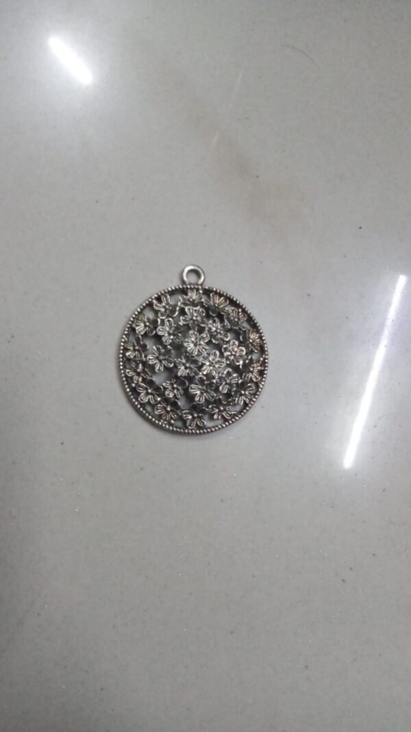 Antique silver flower pendant round small