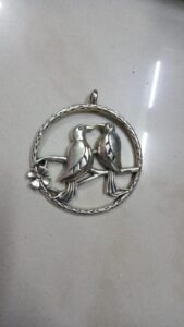Antique silver birds pendant