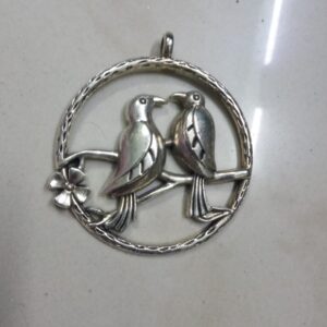 Antique silver birds pendant