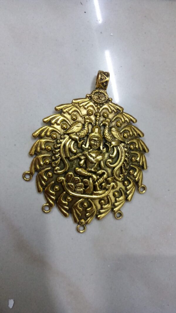 Antique gold krishna pendant