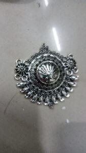 Antique silver flower pendant