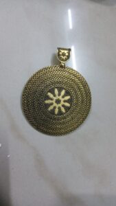 Antique gold round pendant