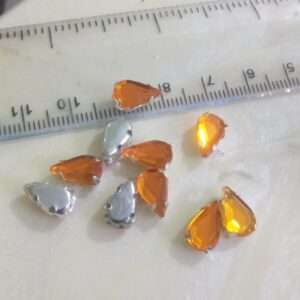 Sewable thilak shape kundans orange 10 pieces pack 10mm length