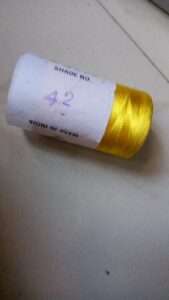 Yellow silk thread 42 double bell