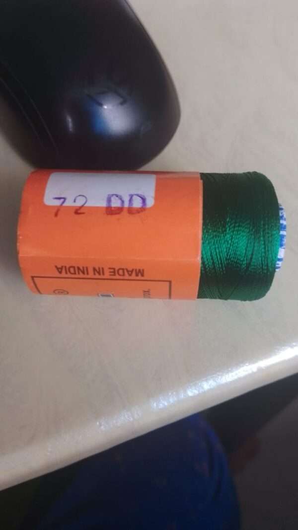 Green colour silk thread spools code 72DD bell brand