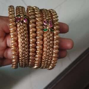 Golden pearl or ceramic kundan silk thread bangles lotus design