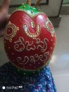 Pelli Kobbari bondam with heart design and couple names