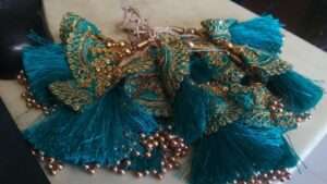 Sea green Latkans or tassels for blouse hangings or lehengas - 1 dozen