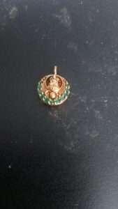 Small round Laxmi pendant with green stones for invisible necklace making