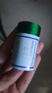 Green colour silk thread spools code 72D Gold Coin brand