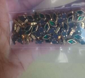 Framed Kundans diamond shape glossy dark green