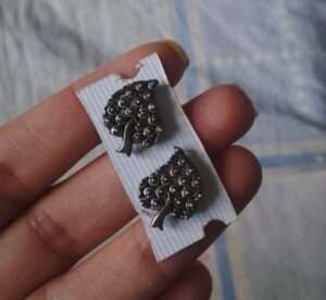 Black metal stud earrings