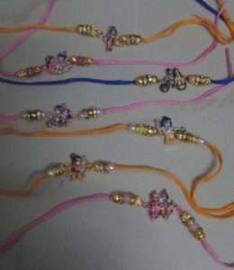 Handamde Rakhis with 3D metal charms