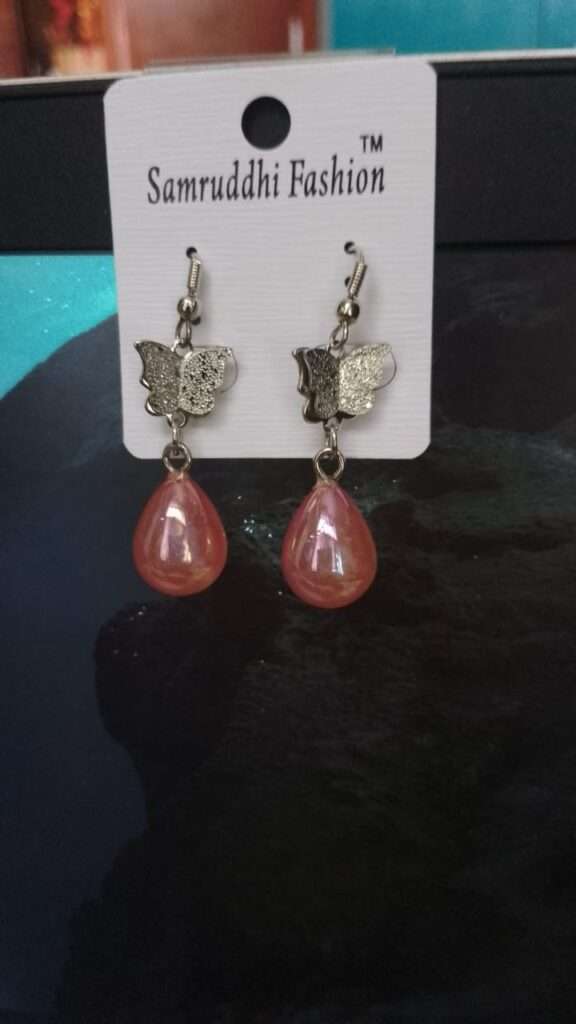 Butterfly stud and peach drop earrings
