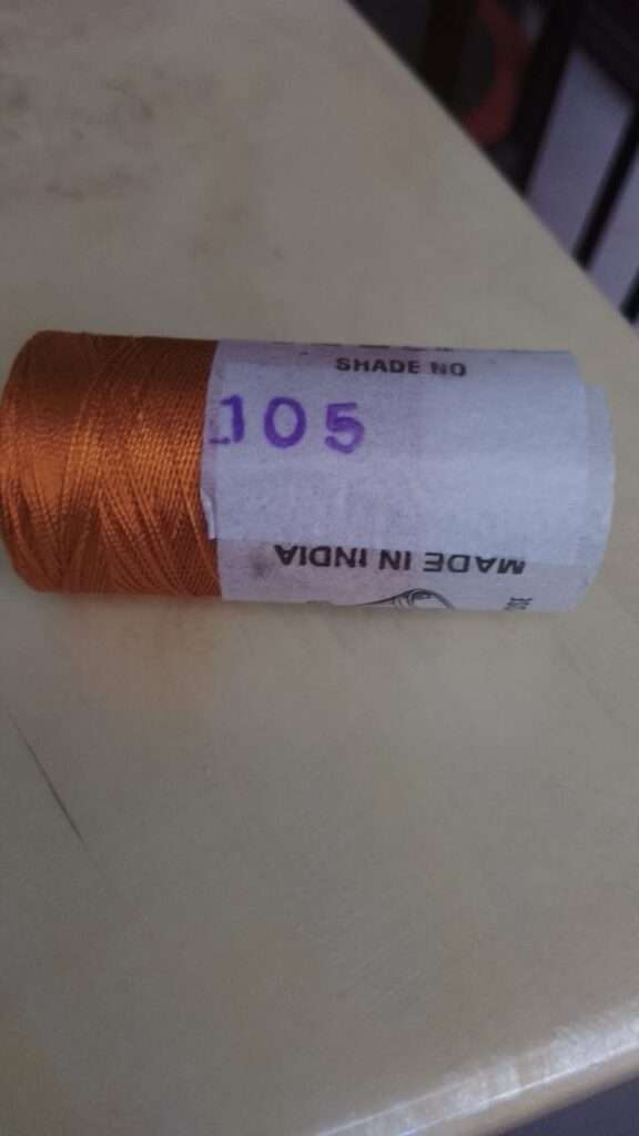 Dark gold silk thread spool 105 double bell