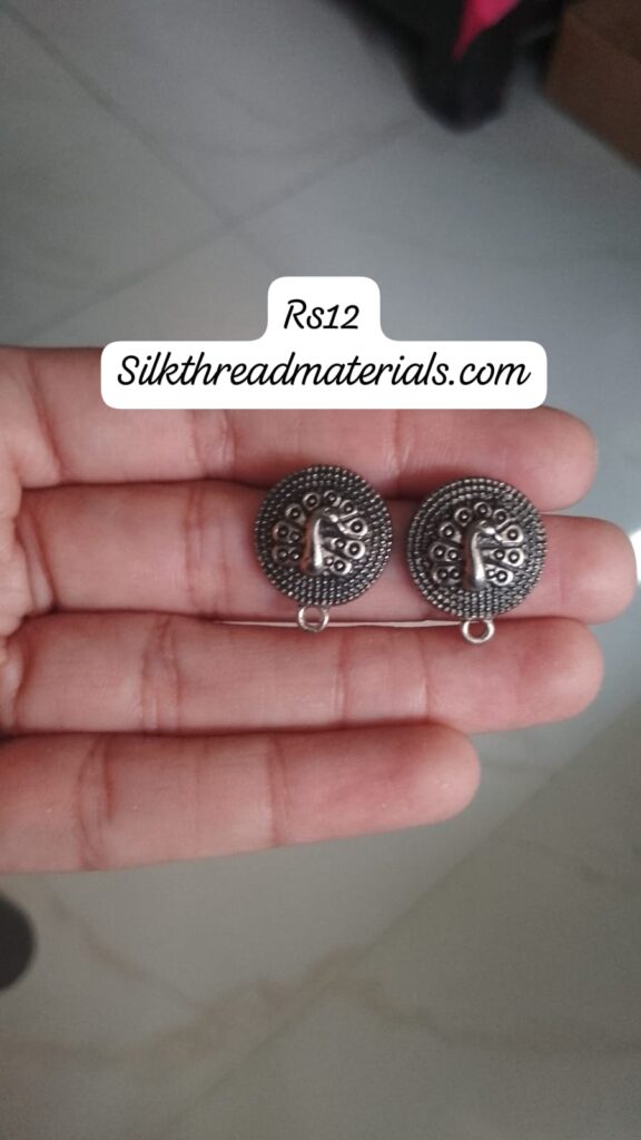German silver peacock round studs