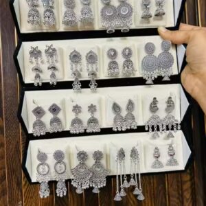 Set of 16 silver tone earrings with box