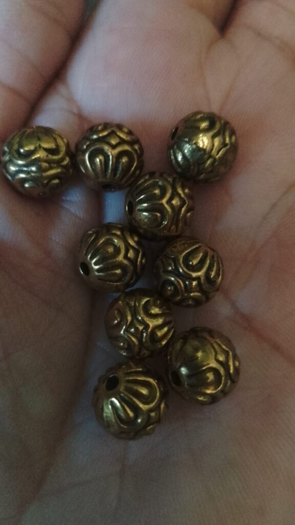 Antique gold beads pack of 9