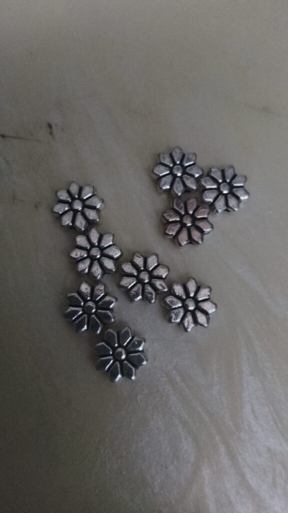 Antique silver flower beads - pack of 9