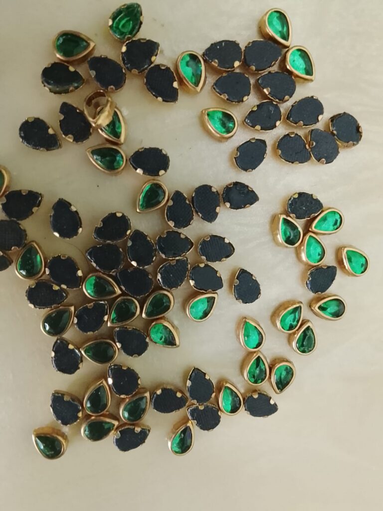 Dark green thilak shape glass kundans 6mm
